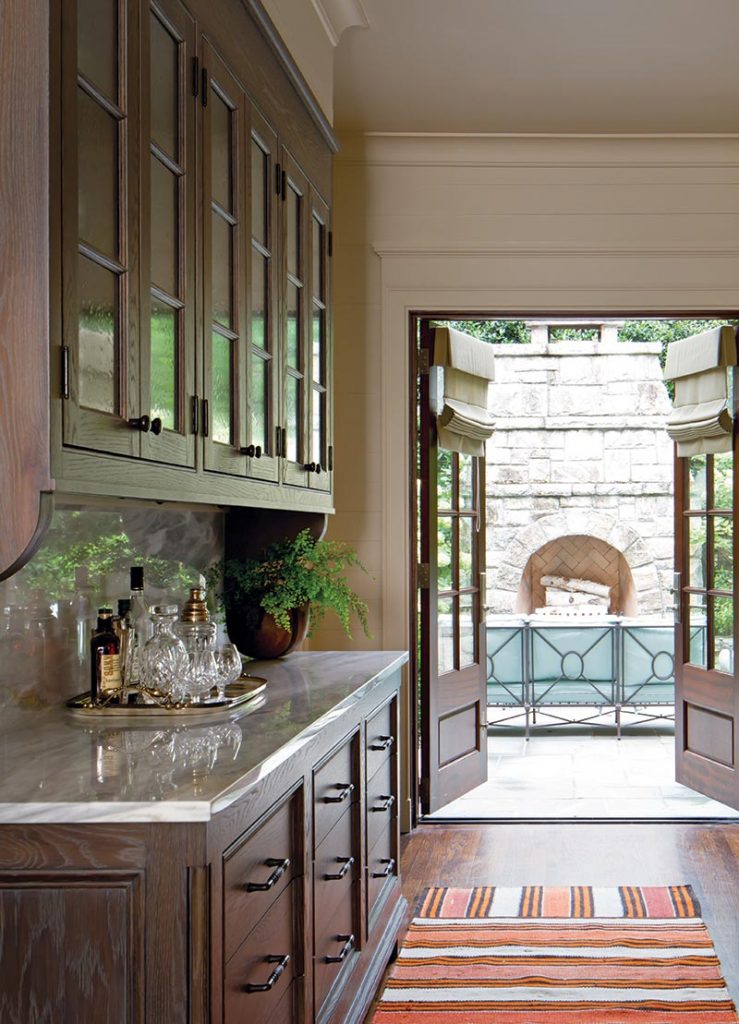 reviously a tight, inefficient pantry, the new butler’s pantry is centrally located to service the main sectors of the house and the outdoor terrace.