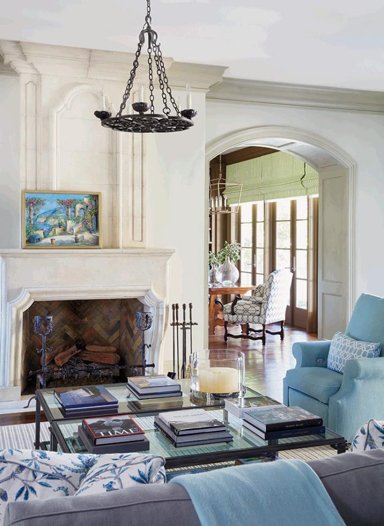 Phillips designed the new limestone mantel and trumeau in the sitting room off the kitchen.