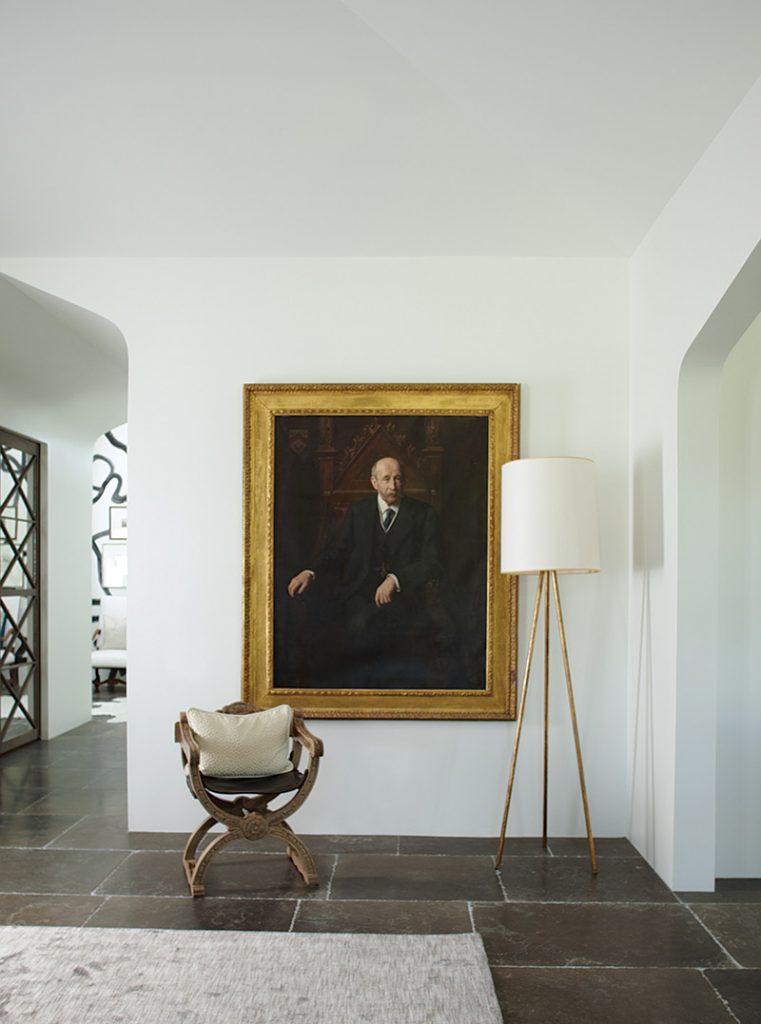 The striking portrait in the living room is not an esteemed ancestor, but there’s a family joke behind its acquisition.