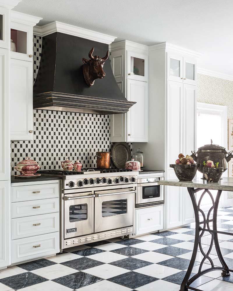 kitchen with checkered floor and back splash