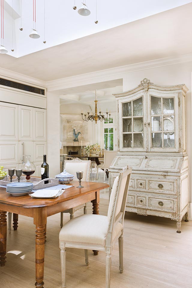 Breakfast room with wooden tables for 1950s renovation.