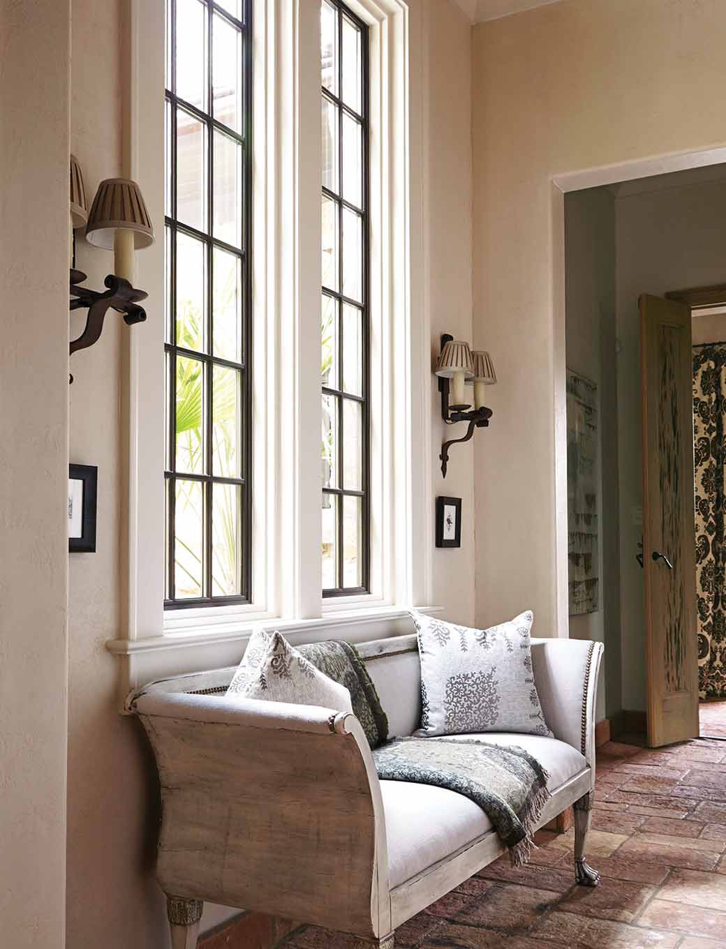 Sitting area with natural light from large pane windows