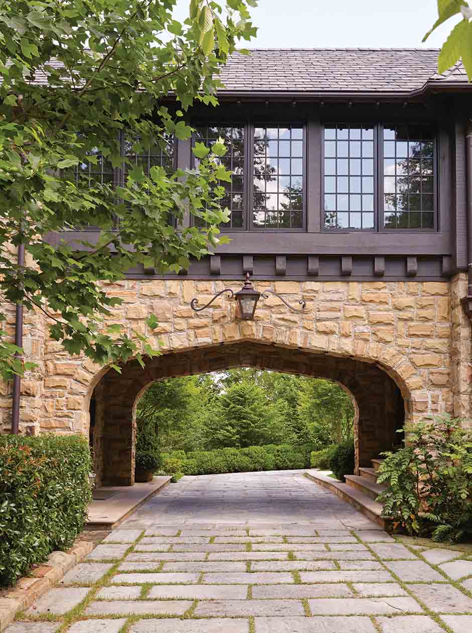 Rock archway with large windows above