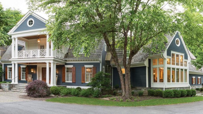 Before + After: An Unbelievable Potomac, Maryland, Home Transformed dark blue front exterior