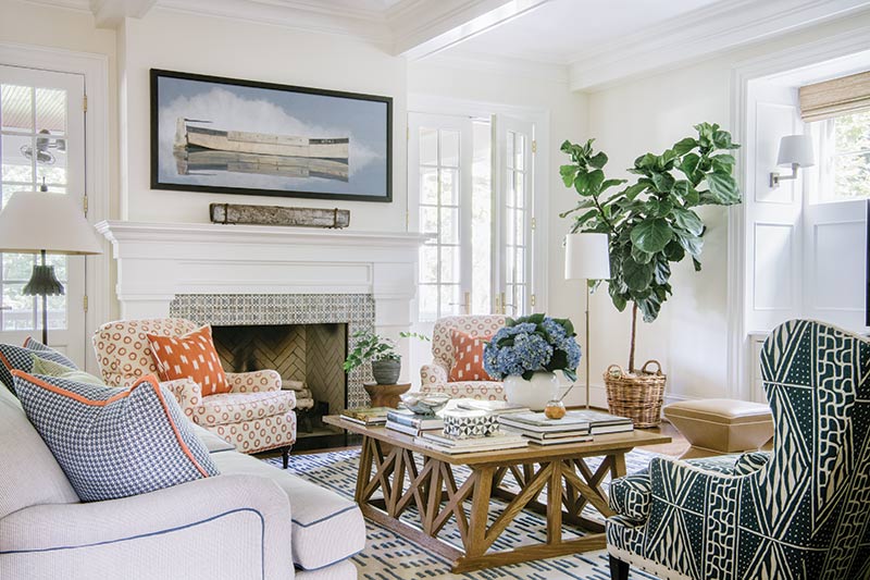 In the family room, a variety of patterns play well together without competing for attention.