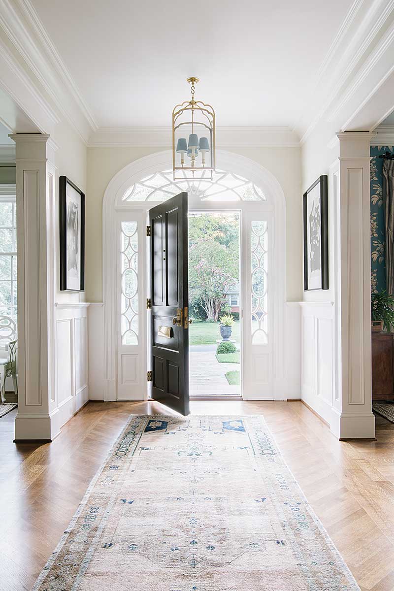 White foyer and black front door