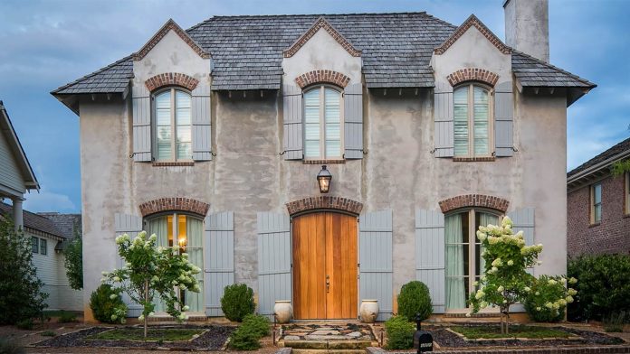 Our 10 Most-Loved Lanterns exterior with lantern and blue shutters