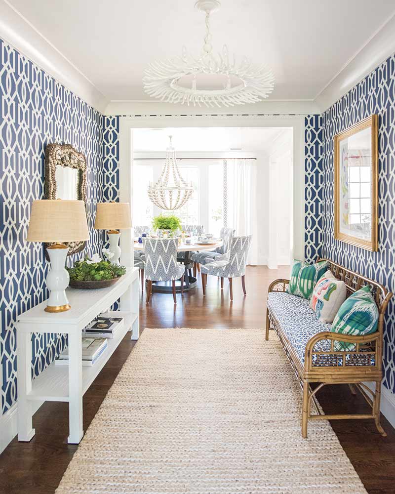 foyer with navy patterned wallpaper in coastal Georgia home