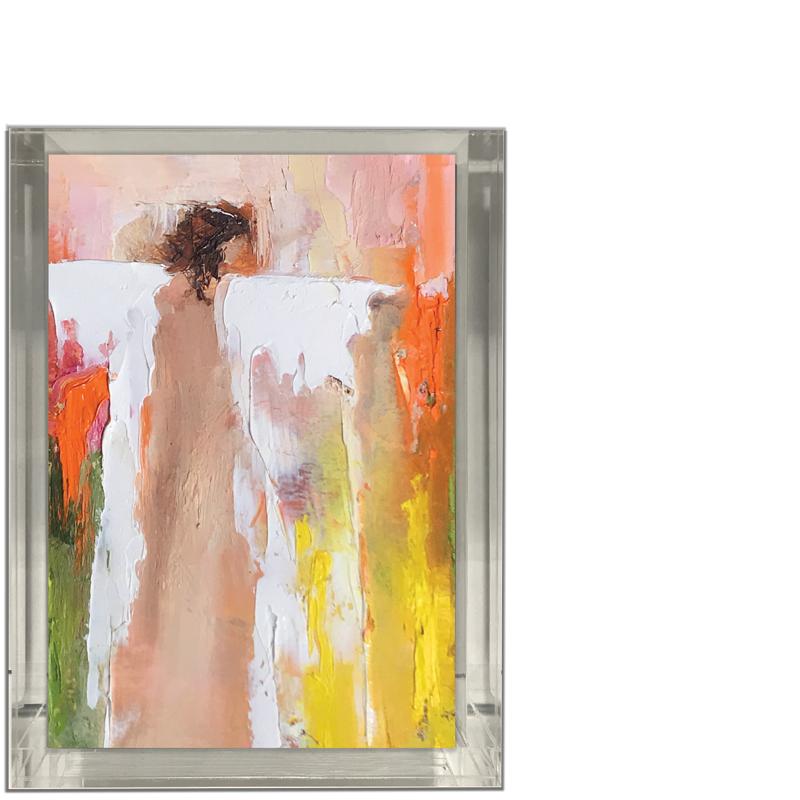 Framed painting of a woman in a white dress from behind