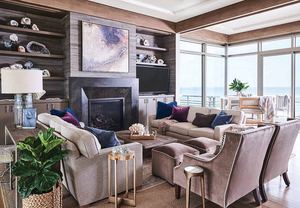Patton used a neutral palette but added in accent colors like amethyst and sapphire. In the living room, geodes are displayed on the built-ins and frame the artwork above the fireplace.